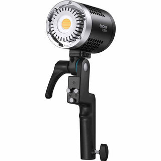 Godox ML30Bi Bi-Color LED attached to handle